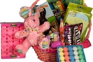 Candy filled pink Easter basket with pink stuffed bunny, jumbo sidewalk chalk, pink bunny peeps