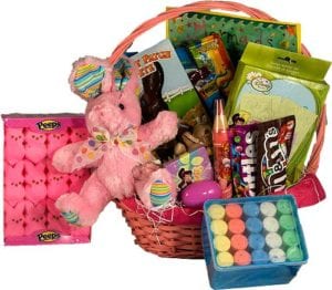 Candy filled pink Easter basket with pink stuffed bunny, jumbo sidewalk chalk, pink bunny peeps