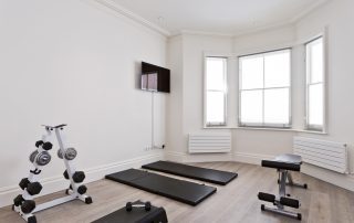 Home gym equipment in spare room